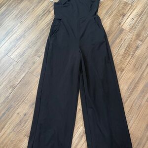 Lulu's Classic Black wide leg Jumpsuit size Large one shoulder like new